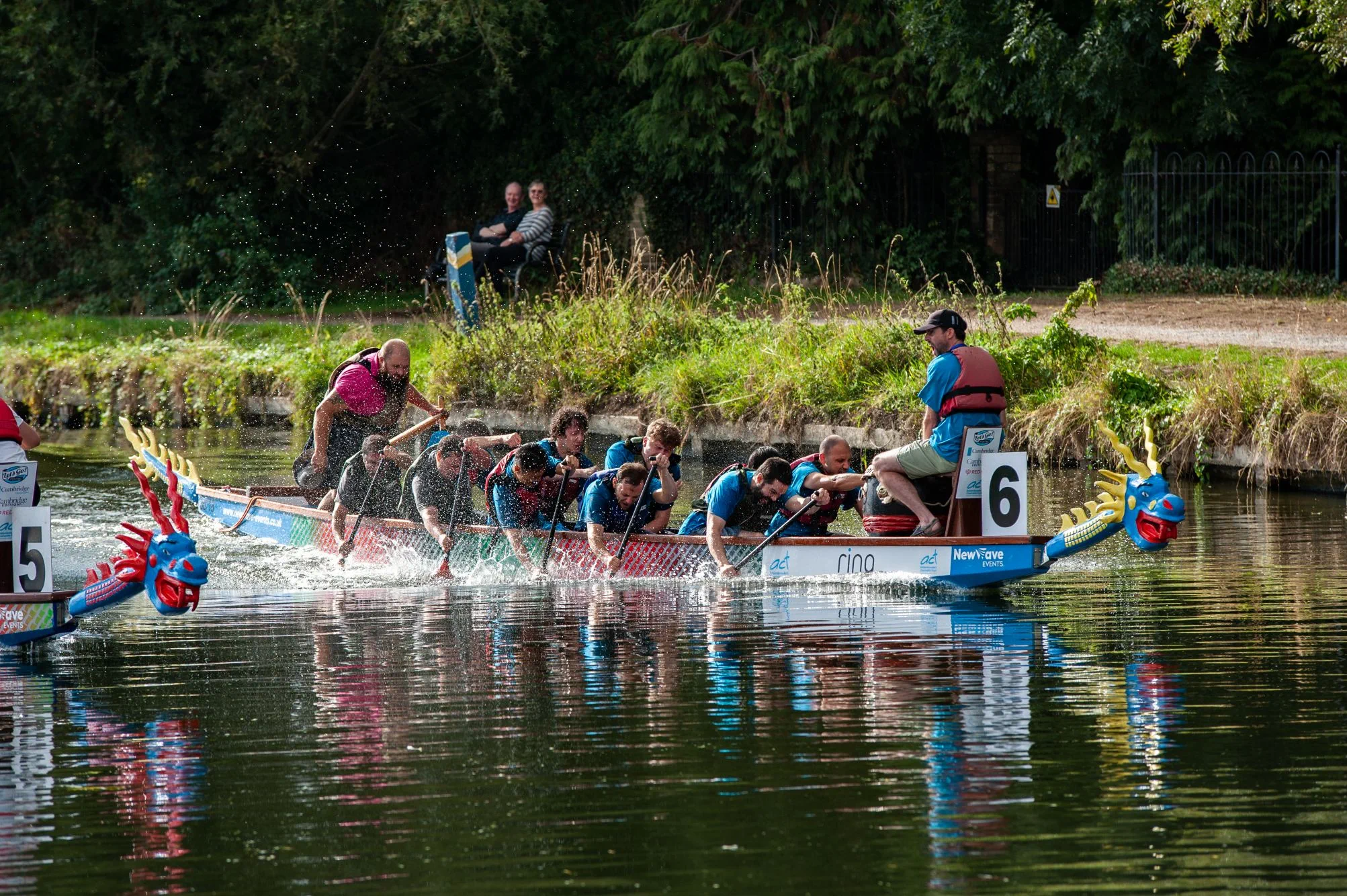 A dragon boat crew racing at a NewWave event